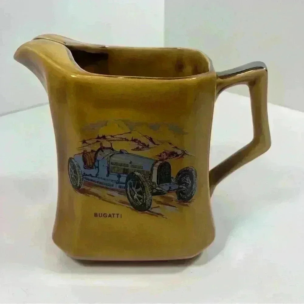 Vintage Wade ceramic jug vase featuring painted antique Bugatti and Sunbeam cars